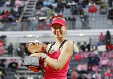 sharapova beats li to retain italian open title