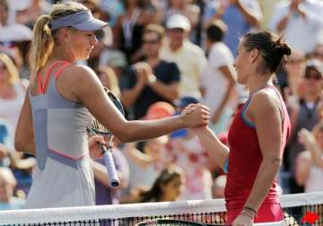 sharapova knocked out of us open by pennetta