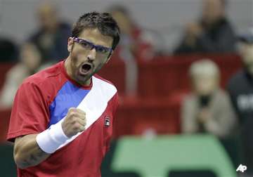 tipsarevic defeats prpic to give serbia 1 0 lead
