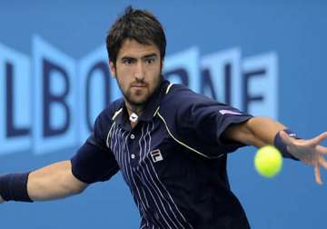 tipsarevic beats simon in japan open