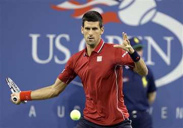 us open top seeded novak djokovic coasts in opener