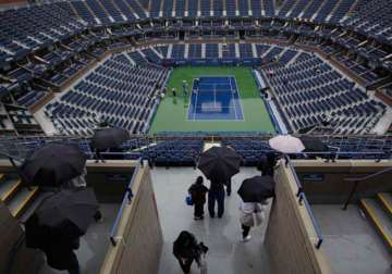 us open rain postpones most matches