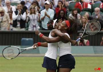 williams sisters advance to quarterfinals