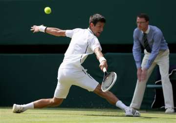 wimbledon djokovic enters men s singles final