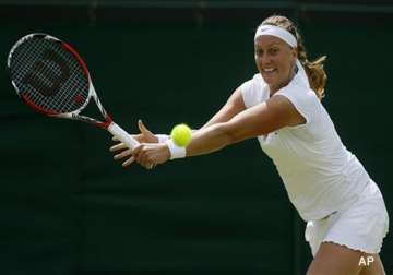 wimbledon kvitova 1st player into quarterfinals