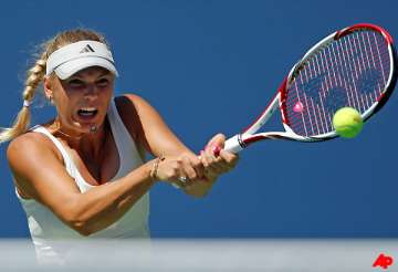 wozniacki saves the intrigue for later