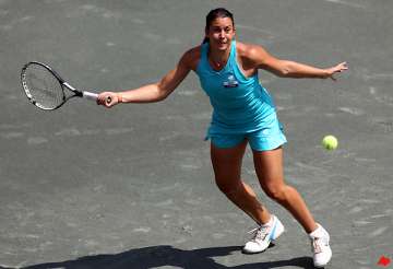 3rd seed bartoli holds on at family circle
