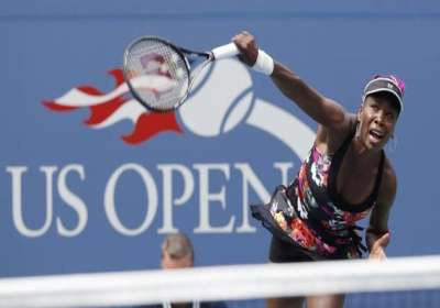 Serena Williams throws her racket after losing the second set tiebreak to  Victoria Azarenka of Belarus in the Woman's Final in Arthur Ashe Stadium at  the U.S. Open Tennis Championships at the
