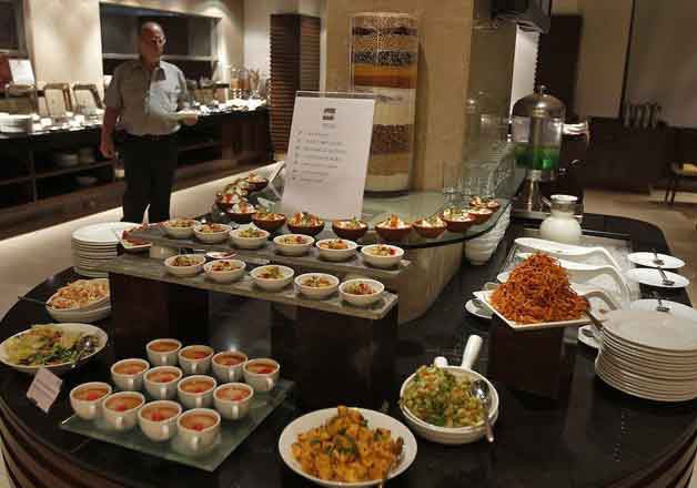 Only AC restaurants allowed to charge service tax, rate at 5.6% -India