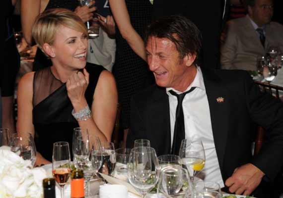 charlize theron sean penn to adopt a child