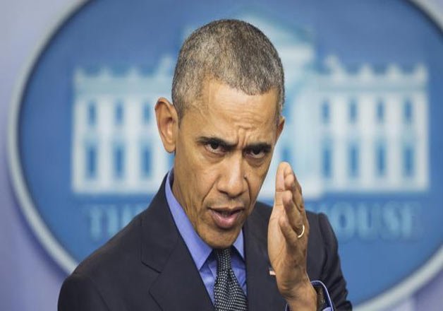 barack obama signs new sanctions against north korea over