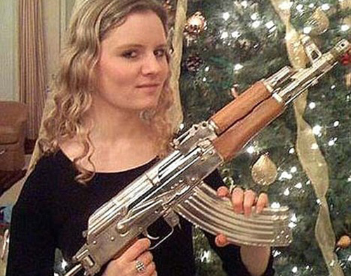 Girl With The Golden Gun British Spy Chief S Daughter Posts Facebook Pic With Saddam S Rifle World News India Tv