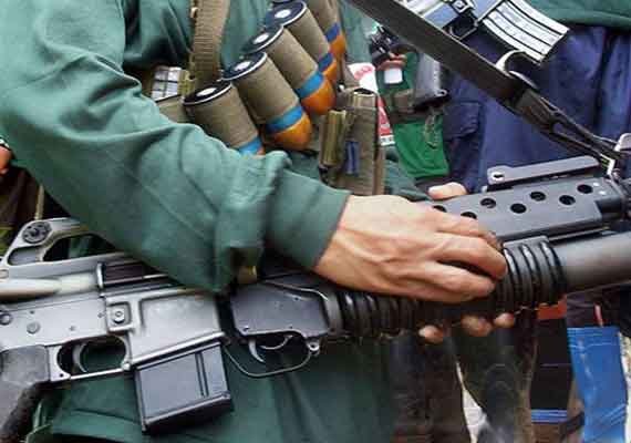 militants threaten to behead malaysian captive