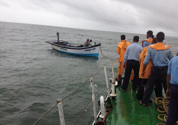 watch how coast guard rescued two indian crew of fishing