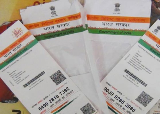 mha reverses stand on aadhaar lends full support