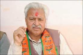 bjp dares azam khan to ban rss in up
