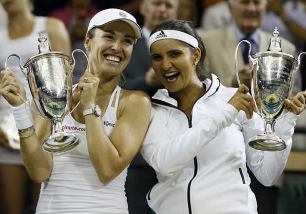 Sania Mirza seals historic Wimbledon doubles crown with Martina  Hingis-IndiaTV News | Tennis News – India TV