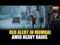 Mumbai: Heavy rains trigger waterlogging, traffic woes and landslide chaos; IMD issues Red Alert