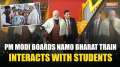 PM Modi takes ride on Namo Bharat train, interacts with school students