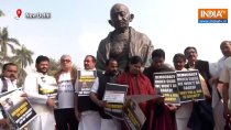 Opposition leaders stage protest at Gandhi statue in Parliament over suspension of MPs