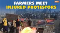 Farmers meet protesters injured during clashes with police during 