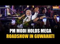 PM Modi Leads a Grand Roadshow in Guwahati, Drawing Massive Crowds