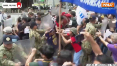 Israel-Hamas War: Pro-Palestinian protesters clash with police in front of US Embassy in Manila