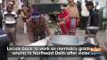 Locals back to work as normalcy gradually returns to Northeast Delhi after violence