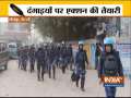 Delhi Police & Rapid Action Force (RAF) personnel conduct flag march in Brahmpuri