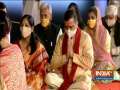 Delhi CM Arvind Kejriwal along with his wife performs 'aarti' at Akshardham temple