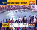 Devotees take a holy dip in river Ganga at Har Ki Pauri in Haridwar on second day of Navratra