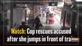 Watch: Cop rescues accused after she jumps in front of train