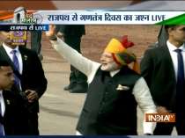 PM Modi greets people after Republic Day parade at Rajpath