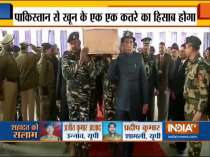 Pulwama Attack: Rajnath Singh lends a shoulder to mortal remains of a CRPF soldier