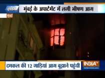 Fire brakes out in an apartment at Malabar Hills area in Mumbai, fire fighting operation is underway