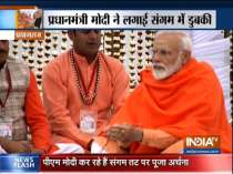 Kumbh 2019 : PM Narendra Modi takes holy dip, performs special puja at Triveni Sangam