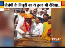 BJP candidate from South Delhi, Ramesh Bidhuri plays drum during his election campaign