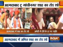 Amit Shah holds a road show in Ahmedabad, Smriti Irani offers prayer in Amethi