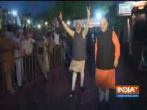 PM Modi arrives at party headquarter, greets people with victory sign