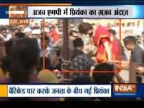 Priyanka Gandhi hops over barricade to meet supporters during public meeting in Indore