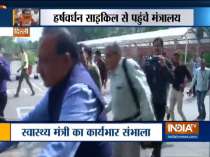 Dr Harsh Vardhan arrives at Ministry of Health and Family Welfare on a bicycle, to take charge