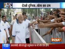 PM Modi interacts with people after performing yoga in Ranchi