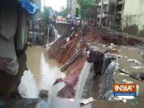Mumbai rains: Rains continue to lash city, portion of road caves at Chandivali area