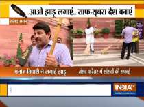Delhi: BJP MPs cleaning Parliament premises as part of 