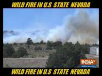 Wildfire threatens about 100 homes near Reno
