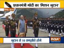 Bhutan: Prime Minister Narendra Modi receives a Guard of Honour in Paro