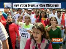 ABVP holds protest march against illegal land occupation near DU