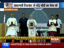 PM Modi launches postal stamps and commemorative coins to mark the 150th birth anniversary of Mahatma Gandhi