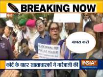 PMC customers stage protest outside Mumbai Court