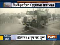 Delhi: EDMC sprinkles water on roads to settle dust as pollution control measure
